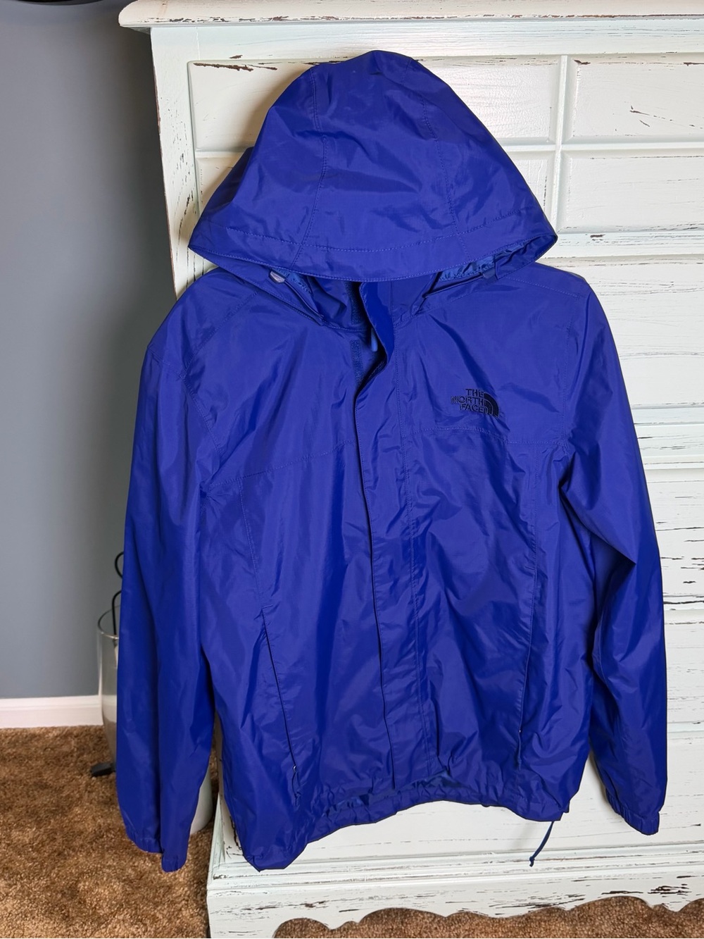 The North Face Men's Hooded Rain Jacket in Bright Blue. Size medium.